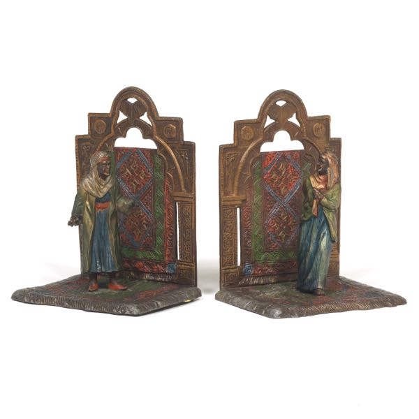 Appraisal: PAIR OF METAL ARAB BOOKENDS x x Polychromed spelter metal