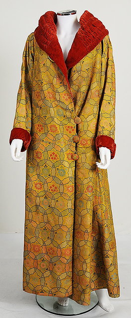 Appraisal: A s long fur lined coat with a bold yellow