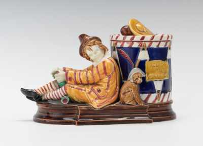 Appraisal: Sarreguemins Majolica Humidor with Boy and Drum Porcelain with high