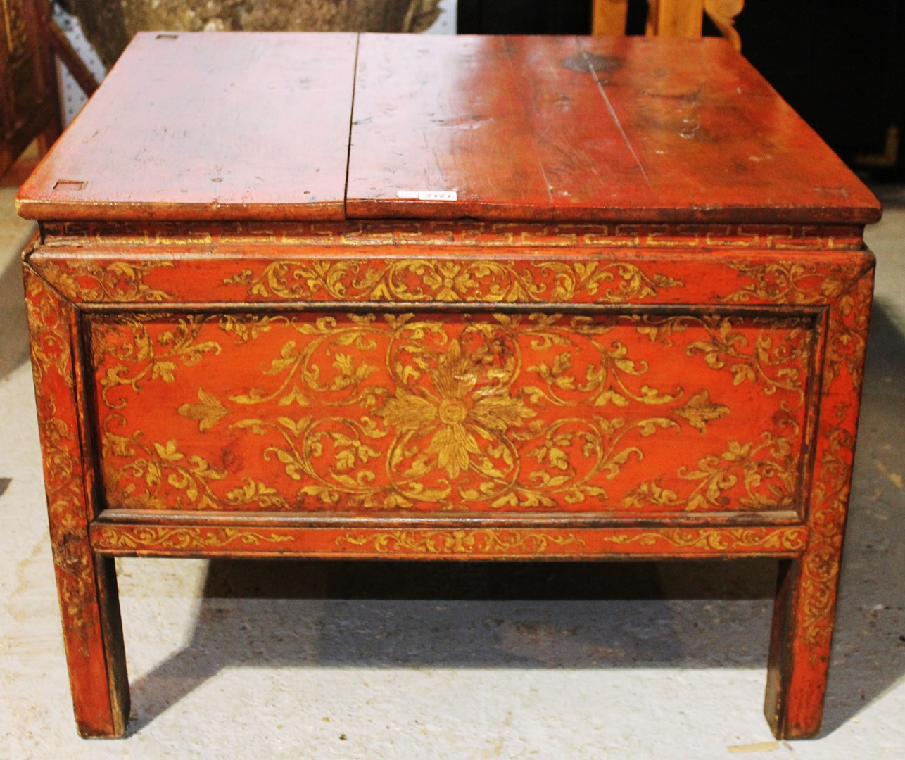 Appraisal: An Eastern red lacquer and floral highlighted hardwood square stand