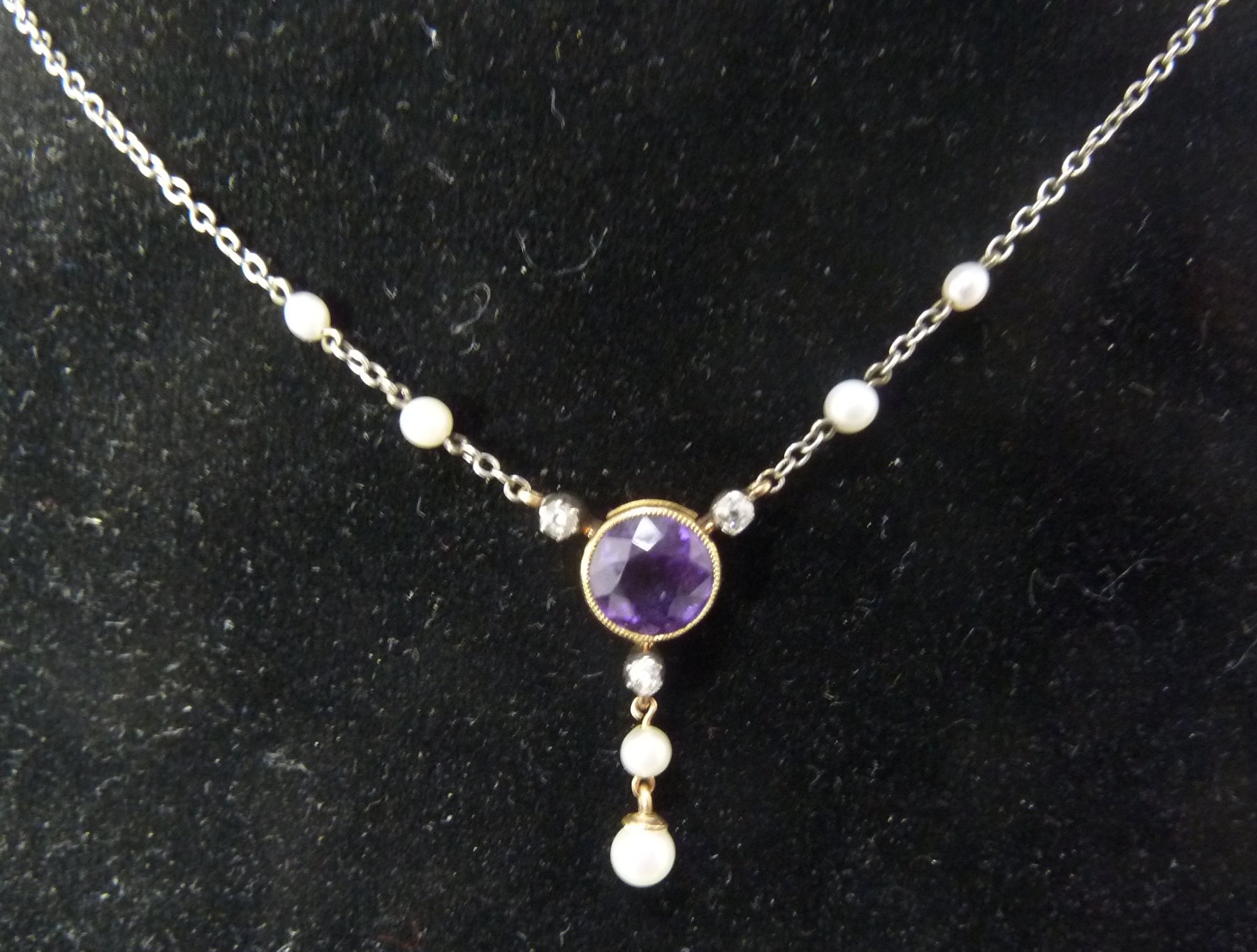 Appraisal: An amethyst diamond and pearl pendant necklace the fine link