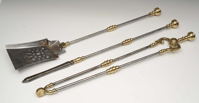 Appraisal: A SET OF THREE ANTIQUE STEEL AND BRASS FIRE IRONS