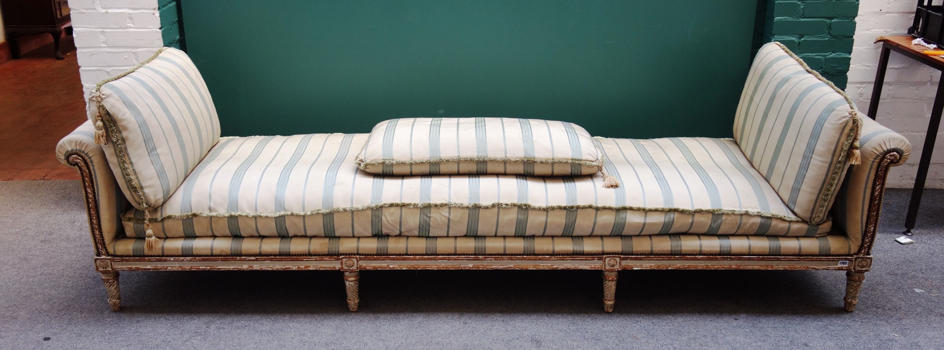 Appraisal: A Louis XVI style large scroll-end day bed the painted