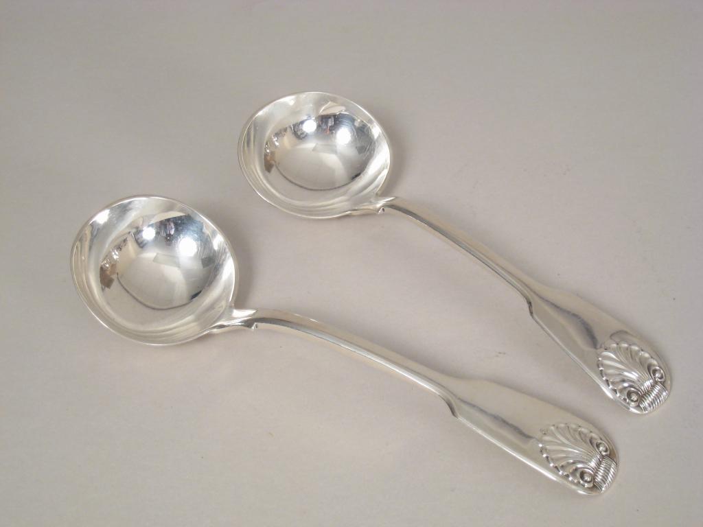 Appraisal: Pair of Victorian Sauce Ladles fiddle and shell pattern London