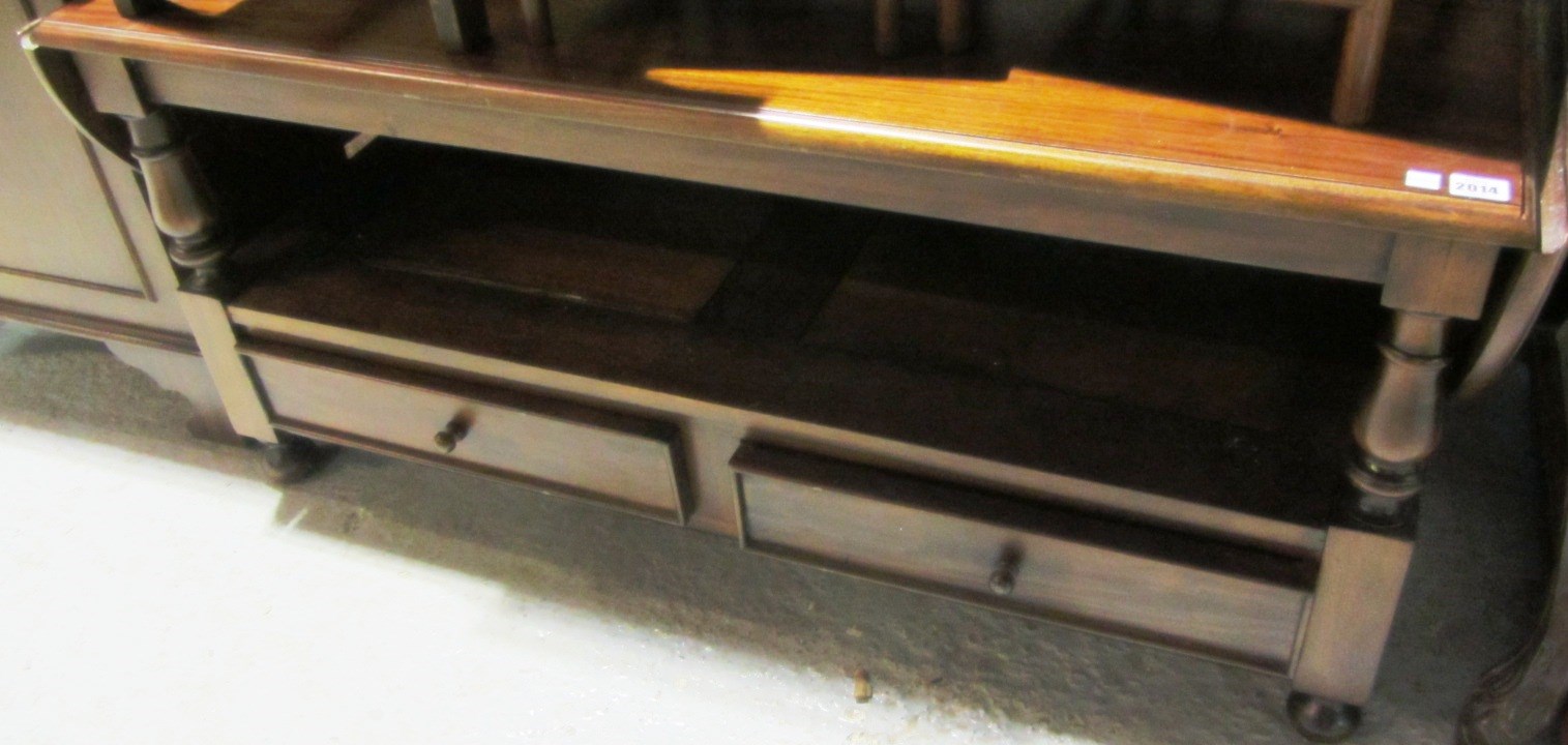 Appraisal: A th century hardwood drop flap coffee table with drawers