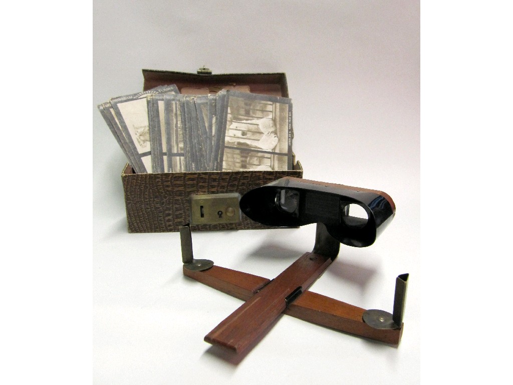 Appraisal: Early th century oak and bakelite stereoscopic viewer with a