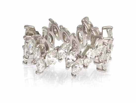 Appraisal: A Platinum and Diamond Zigzag Eternity Band containing marquise cut