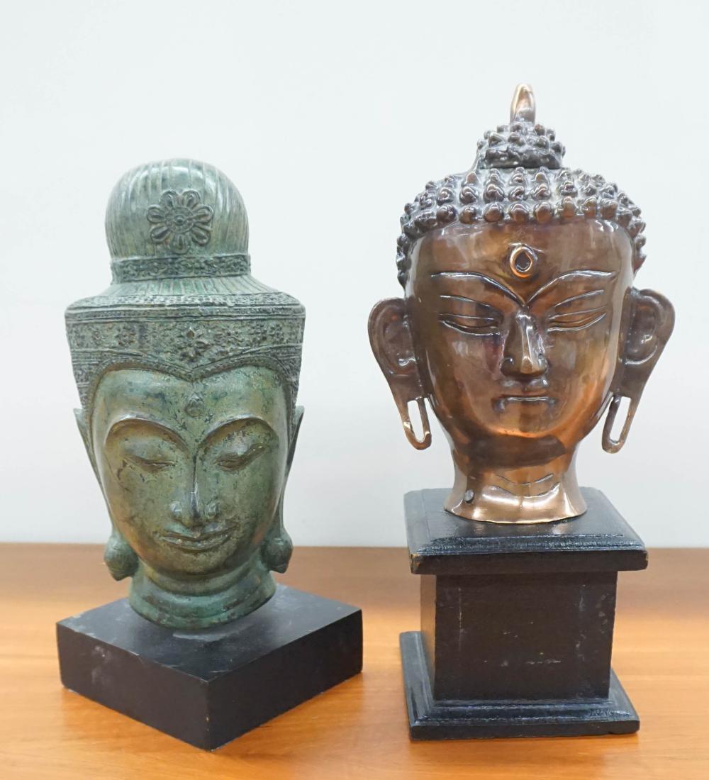 Appraisal: TWO SOUTHEAST ASIAN METAL BUDDHA BUSTS H OF TALLER IN