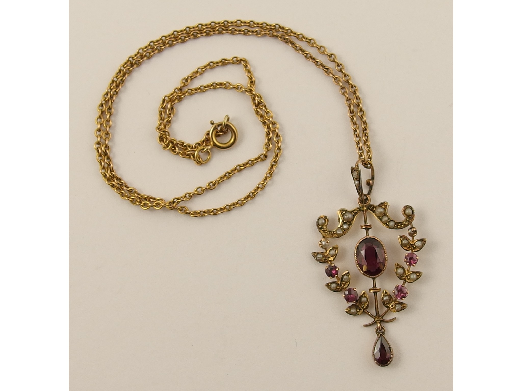 Appraisal: A ct garnet and seed pearl Edwardian pendant and chain