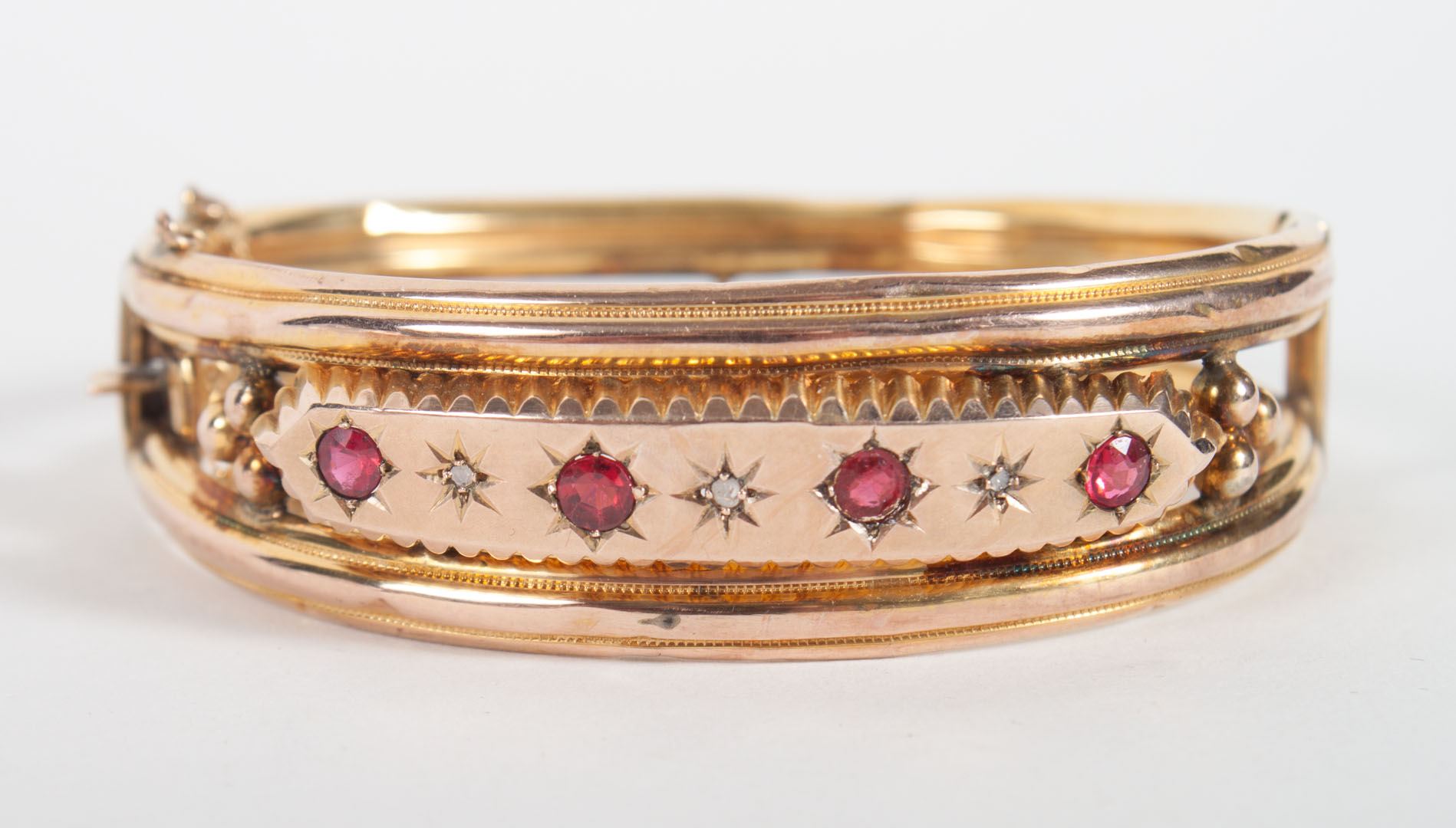 Appraisal: Victorian K gold ruby diamond bangle bracelet circa grams