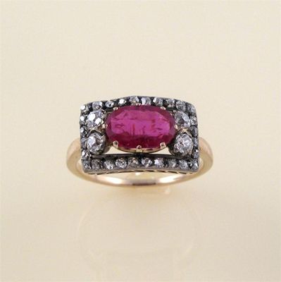 Appraisal: A th century ruby and diamond ring the long oval