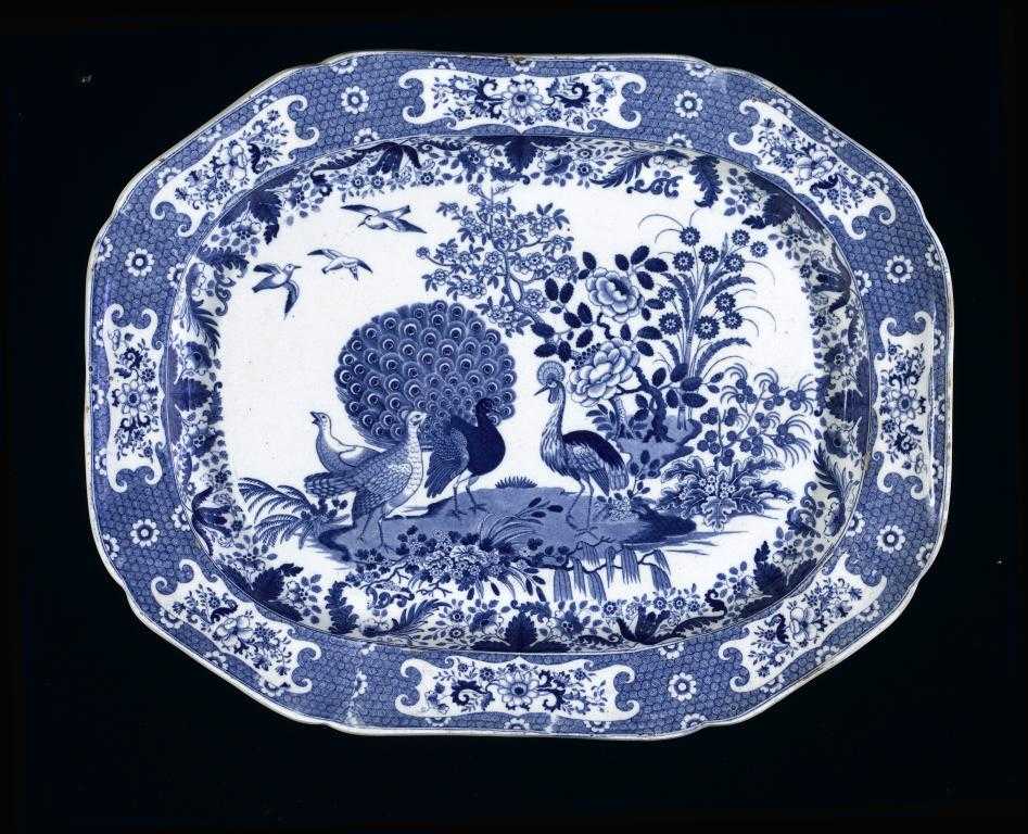 Appraisal: A BLUE PRINTED EARTHENWARE ORNITHOLOGICAL SERIES MEAT DISH with peafowl