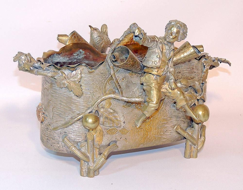 Appraisal: Bronze Figural Planter Silvered with a figural and foliate decoration