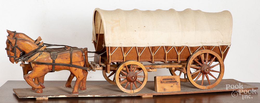 Appraisal: Large carved Conestoga wagon by Lichtenwalner Large carved Conestoga wagon