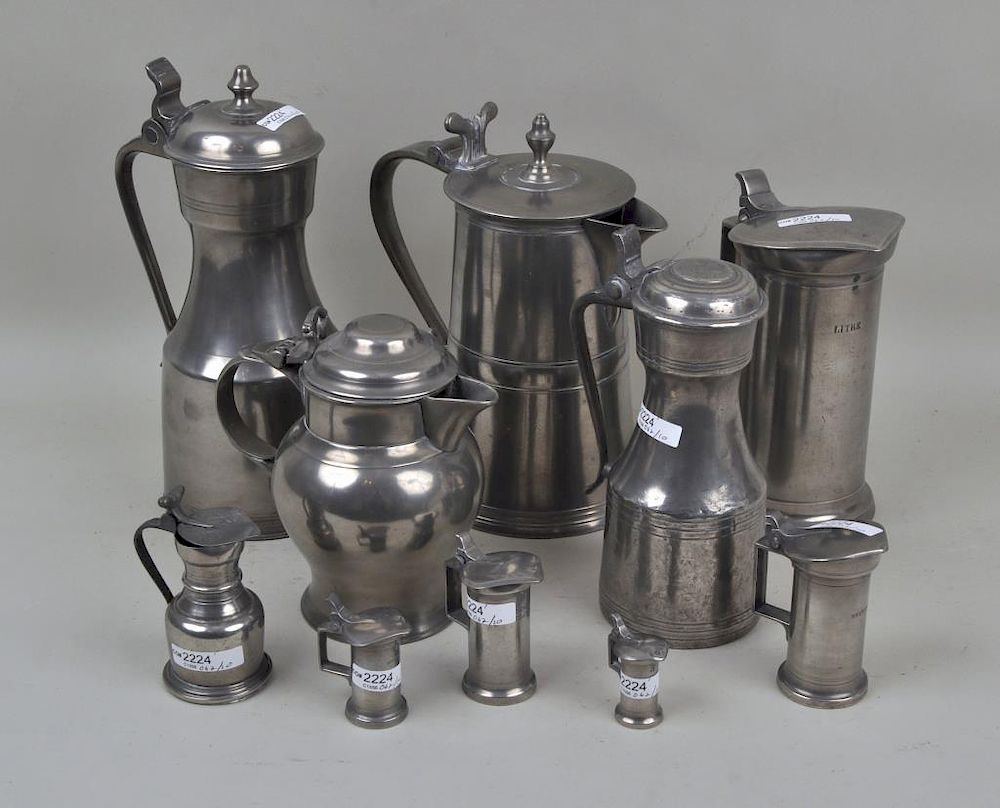 Appraisal: Two Pewter Pitchers Eight Pewter Flagons some hallmarked Use wear