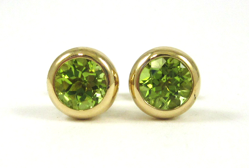 Appraisal: PAIR OF PERIDOT EAR STUDS each k yellow gold set