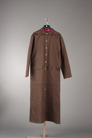 Appraisal: Worth long dark brown slicker with snap front and hot