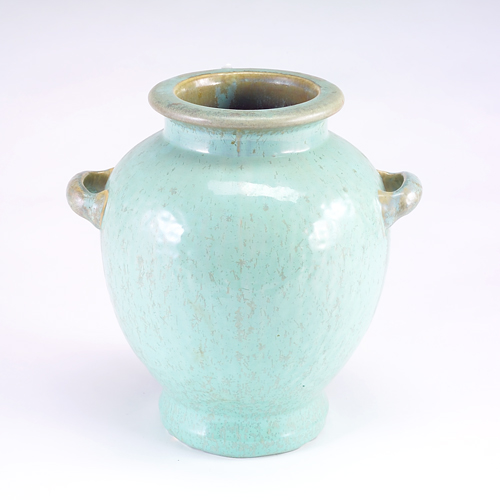 Appraisal: FULPER Large two-handled urn in hammered texture covered in turquoise