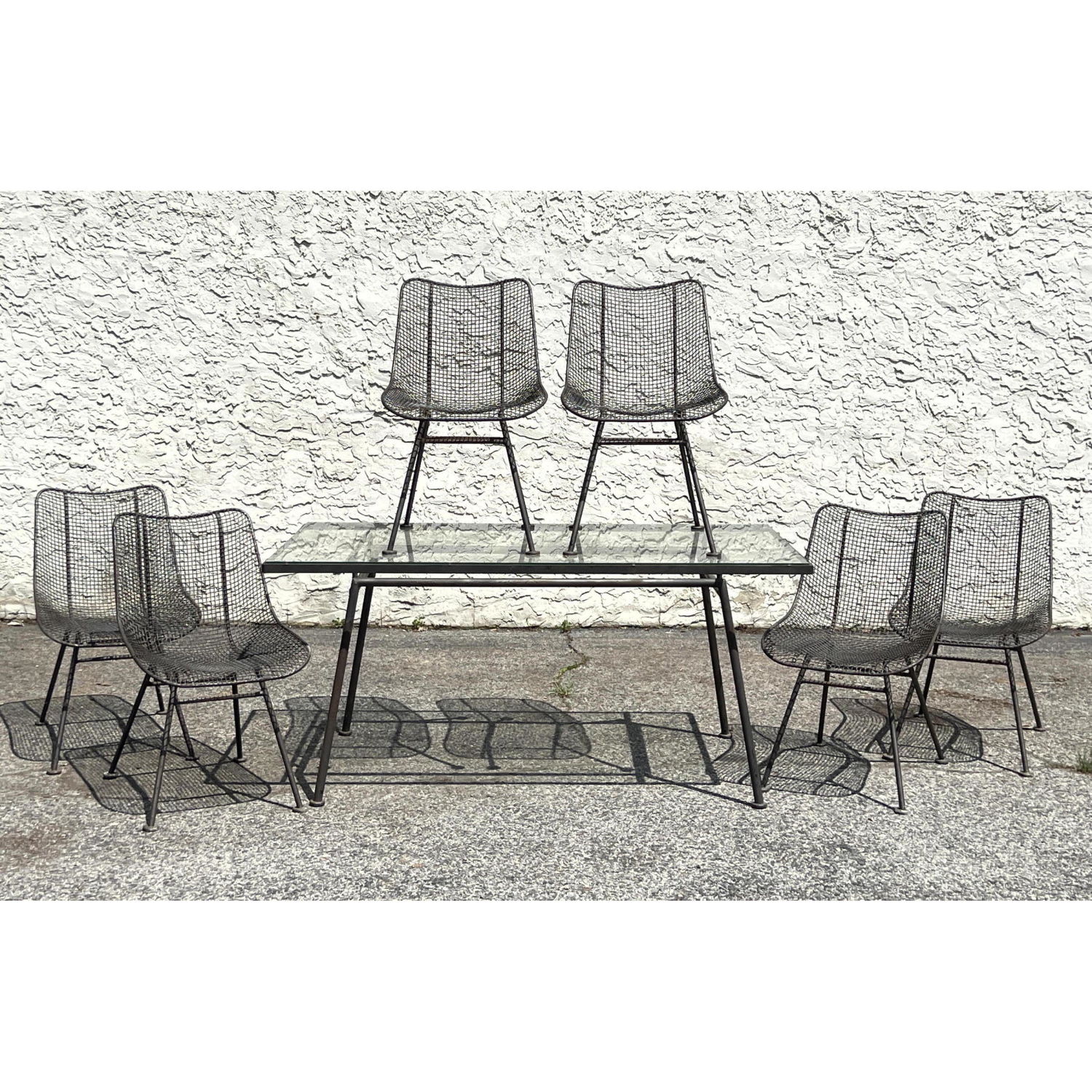 Appraisal: pc RUSSELL WOODARD Sculptura Metal Outdoor Table Chairs Large Glass