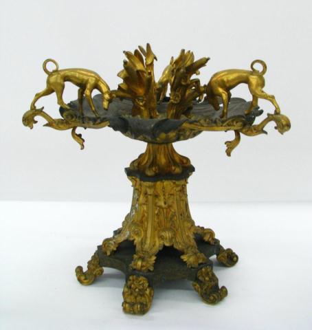 Appraisal: Cast bronze and cast metal centerpiece with gold gilt three