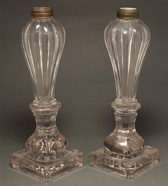 Appraisal: Pair of American molded clear glass whale oil lamps probably