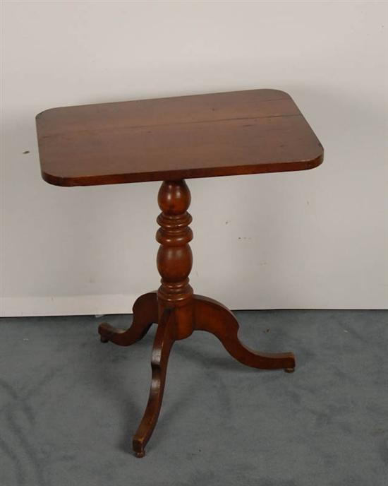 Appraisal: An E th C Cherry Tilt-top Table having a rounded