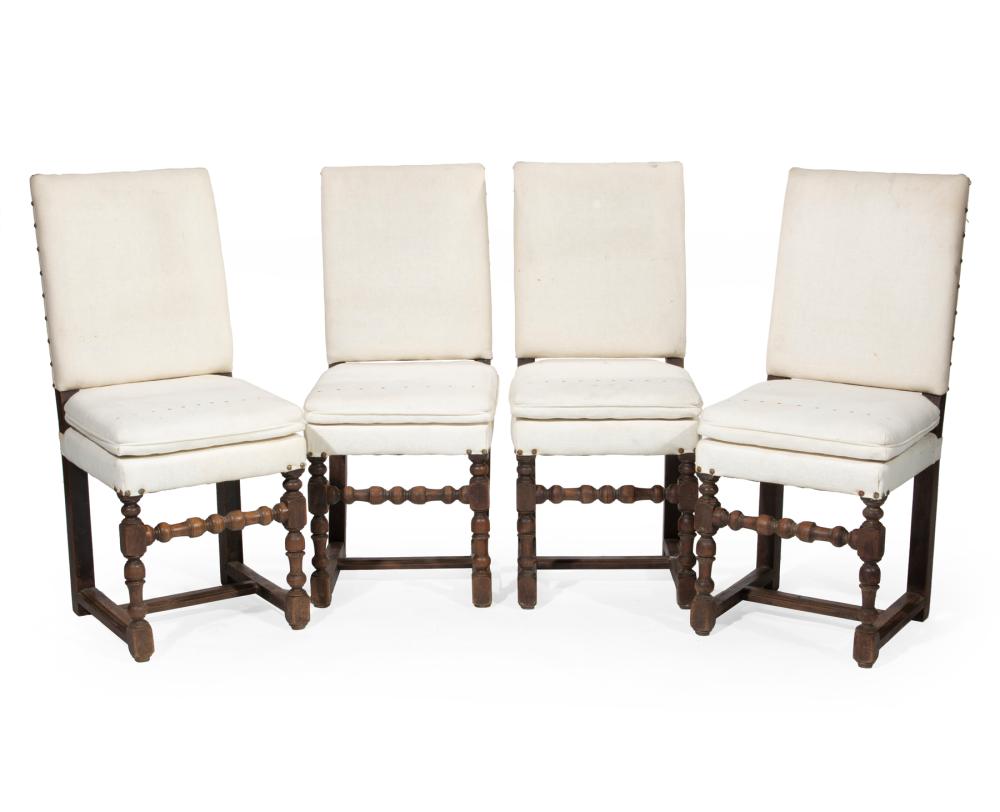 Appraisal: Four Baroque-Style Carved Walnut Side Chairs th c white upholstery