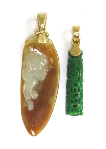 Appraisal: TWO JADE AND FOURTEEN KARAT GOLD PENDANTS including a carved