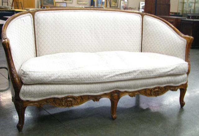 Appraisal: Vintage mahogany French-style sofa down seat cushion with carved frame