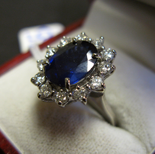 Appraisal: SAPPHIRE DIAMOND AND FOURTEEN KARAT WHITE GOLD RING WITH APPRAISAL