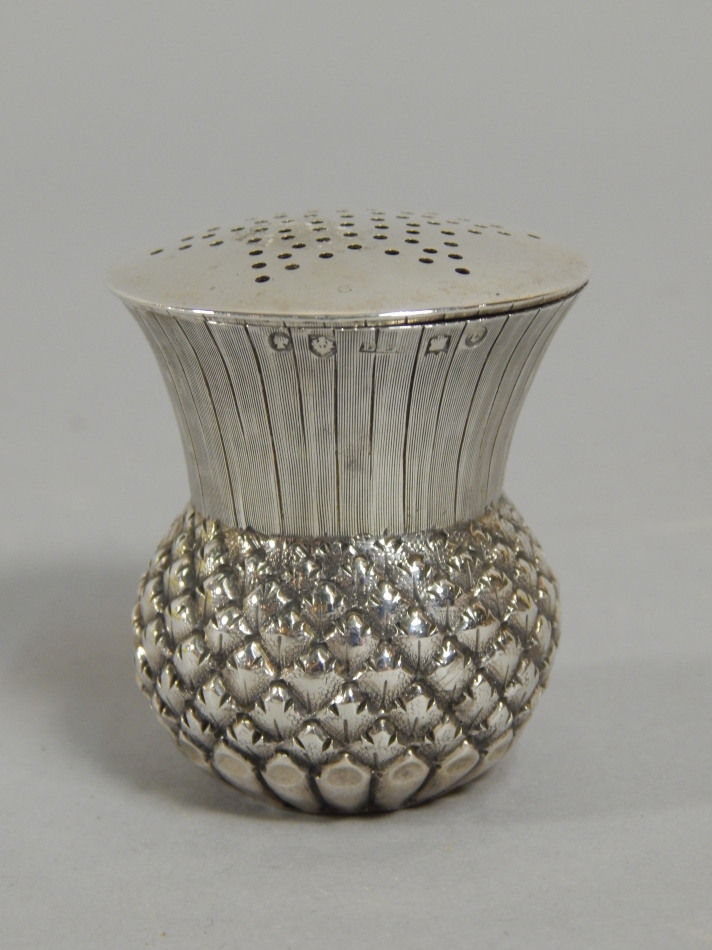 Appraisal: A Victorian silver pepper pot cast in the form of