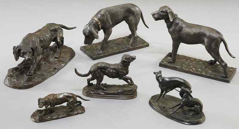 Appraisal: Patinated bronze dog figuresmodeled as various breeds by different sculptors