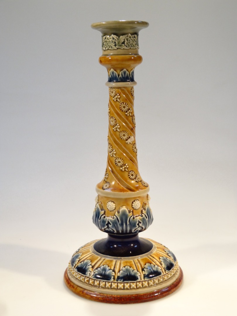 Appraisal: A late thC Doulton Lambeth pottery candlestick the shaped tapering