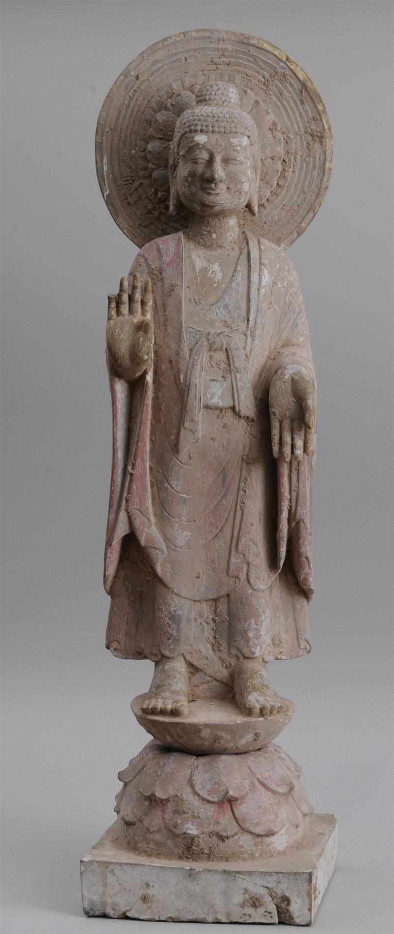 Appraisal: CHINESE PAINTED LIMESTONE FIGURE OF BUDDHA The bare-foot figure wearing