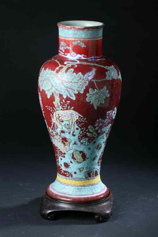 Appraisal: CHINESE COPPER RED AND FAMILLE ROSE PORCELAIN VASE late Qing