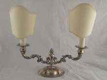 Appraisal: A two branch continental silver candelabrum marked converted for electricity