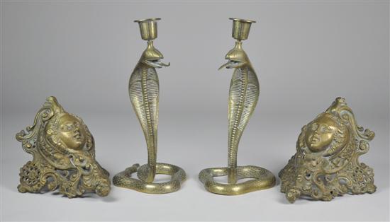 Appraisal: Pair of Brass Candlesticks Circa Cobra form with coiled bases