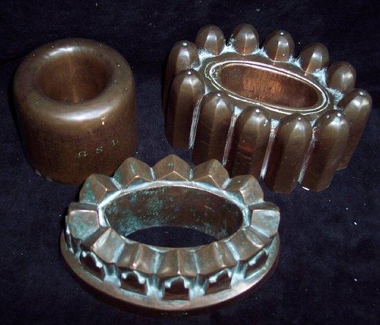 Appraisal: A copper mould of oval crown shape stamped John Finlay