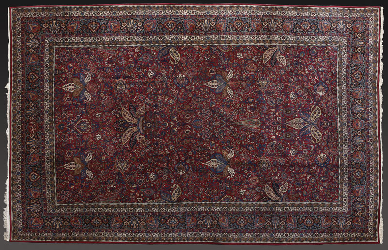 Appraisal: A Persian Mashad woolen carpet rug A Persian Mashad woolen