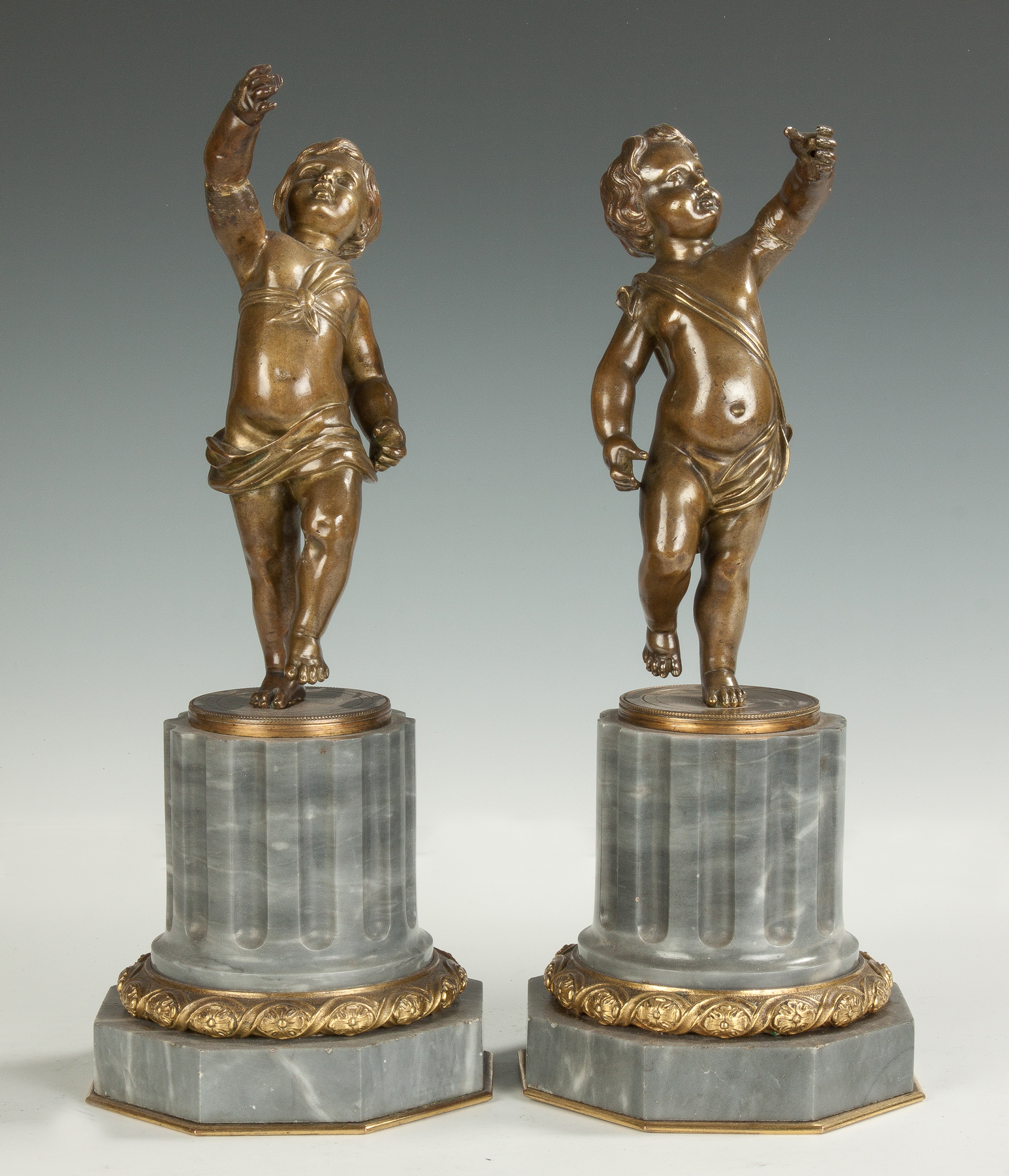 Appraisal: Bronze Cherubs with Marble Bases th cent