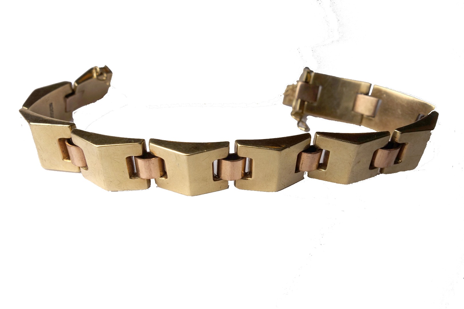 Appraisal: A bi-colour bracelet in the form of yellow bevelled rectangular