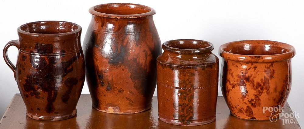 Appraisal: Four Pennsylvania redware jars and crocks Four Pennsylvania redware jars