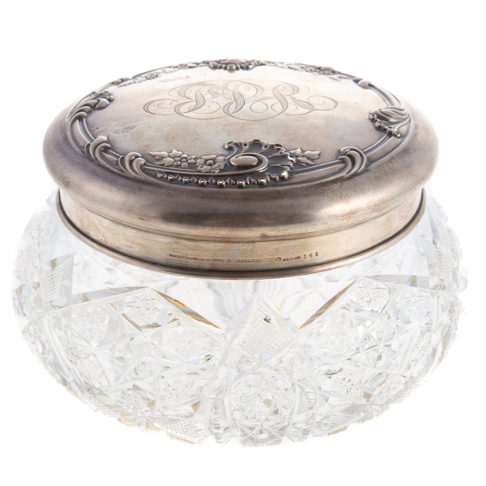 Appraisal: AMERICAN CUT GLASS POWDER JAR WITH SILVER LID Early th