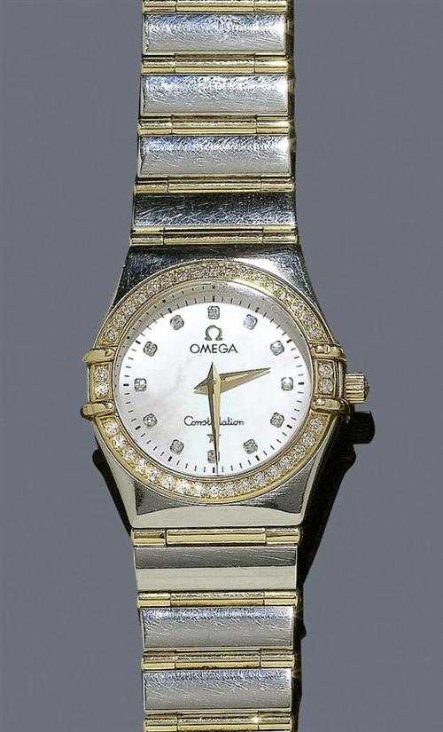 Appraisal: DIAMOND LADY'S WRISTWATCH OMEGA CONSTELLATION s Steel and yellow gold