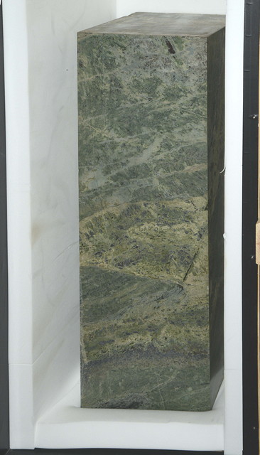 Appraisal: AN ANTIQUE GREEN MARBLE PLINTH of square form with natural