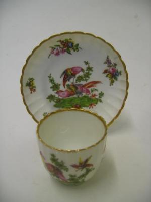 Appraisal: A CONTINENTAL PORCELAIN CUP AND SAUCER probably th century of