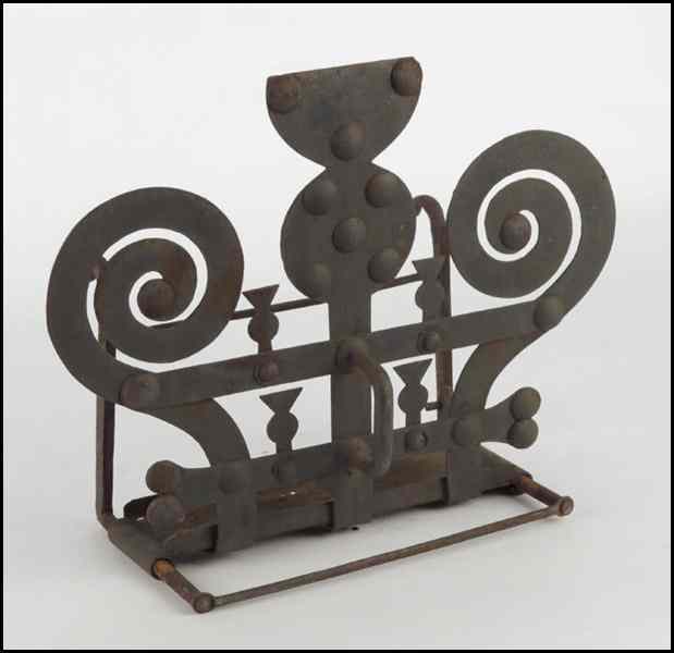 Appraisal: TH TH CENTURY SCOTTISH IRON TOASTER Bearing thistle between ram's