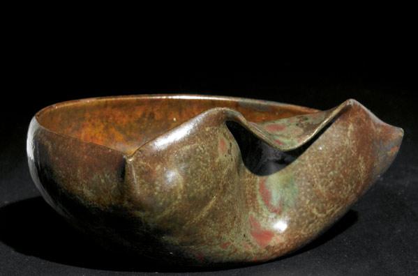 Appraisal: GEORGE OHR Pinched and dimpled low vessel covered in an