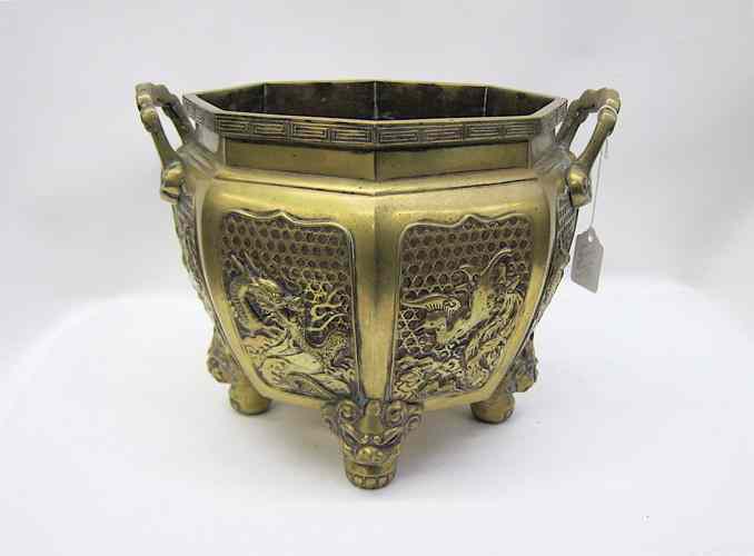 Appraisal: CHINESE BRONZE CENSOR PLANTER with open handles side panels alternating