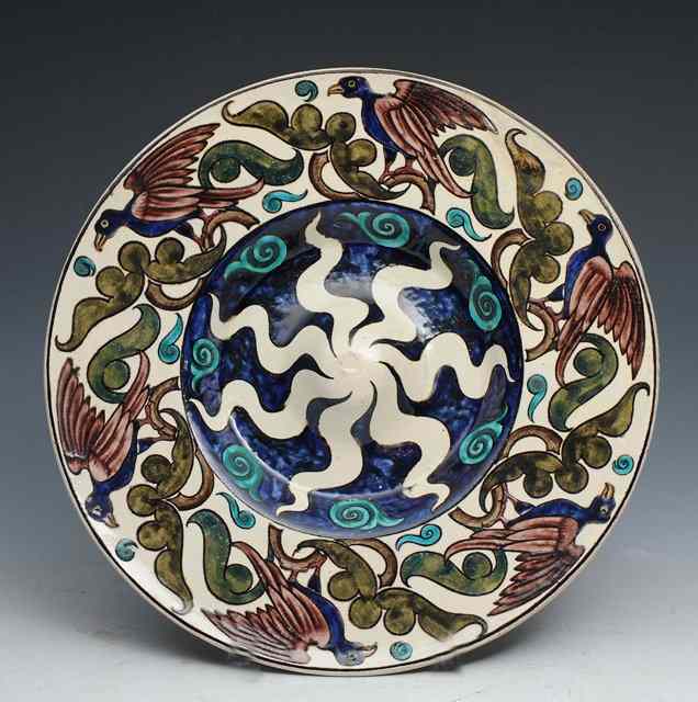 Appraisal: William De Morgan British - A dish painted with birds